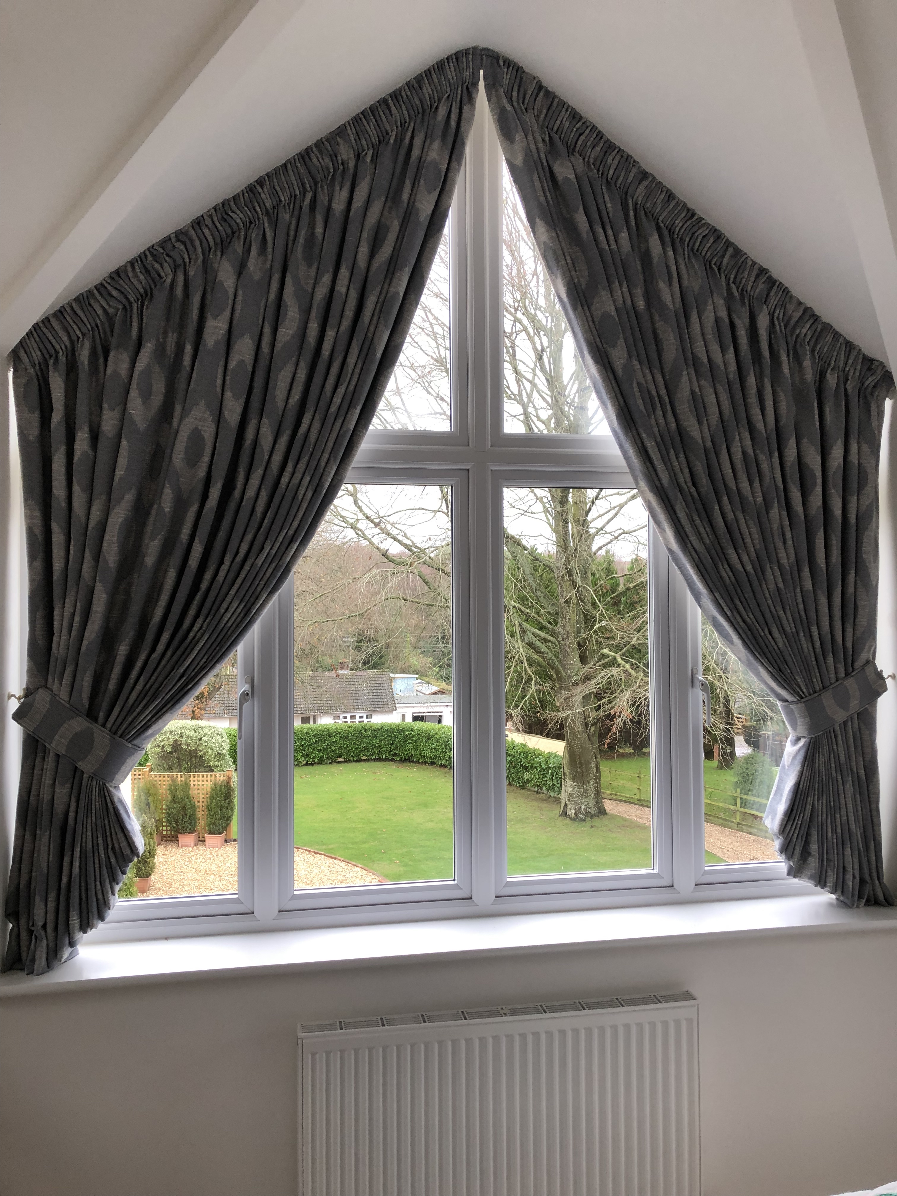 Shaped window curtain pricing example