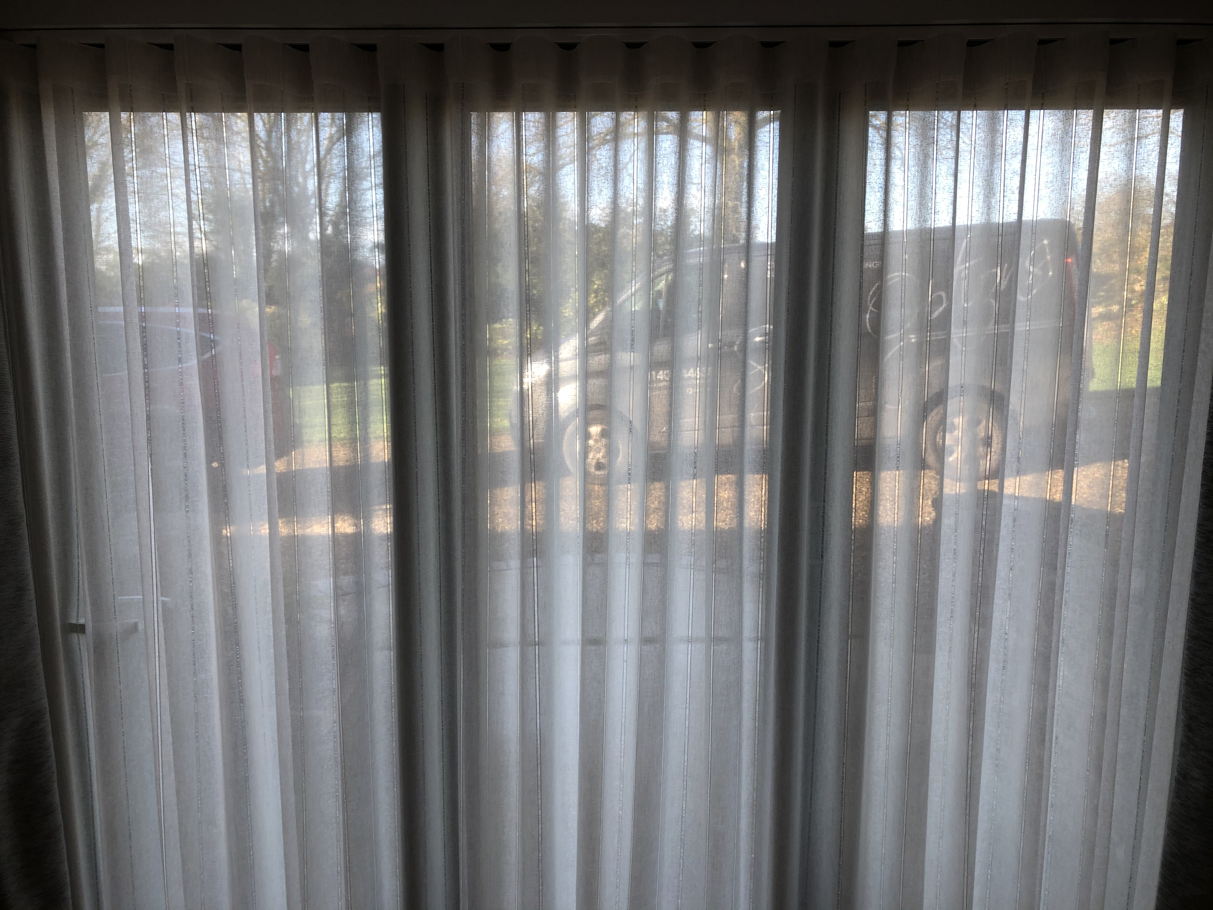 Full-width voile curtains